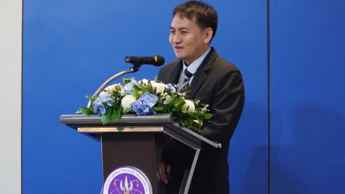 A man speaking at a podium