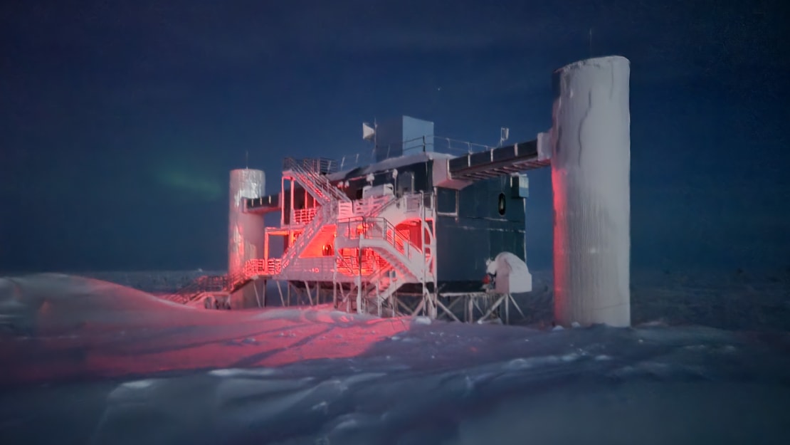 The IceCube Lab against the early dawn sky