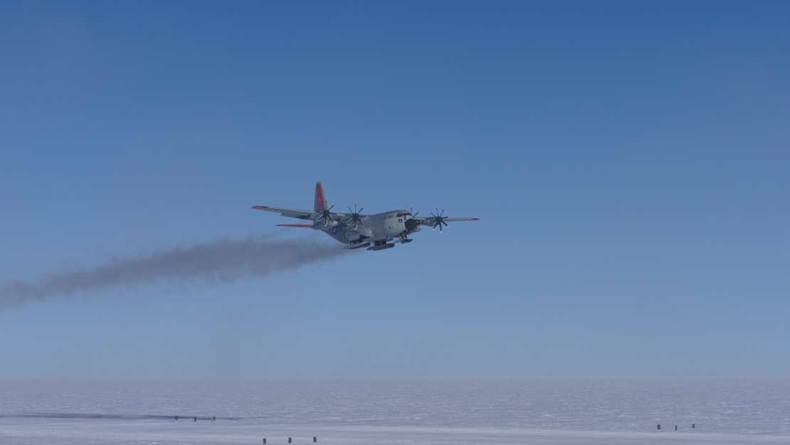 An LC-130 plane seen in the air shortly after takeoff.