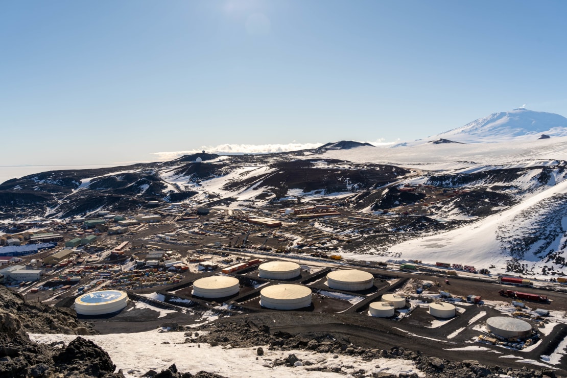 A high-up view of McMurdo with Mt. Erebus in the distance.