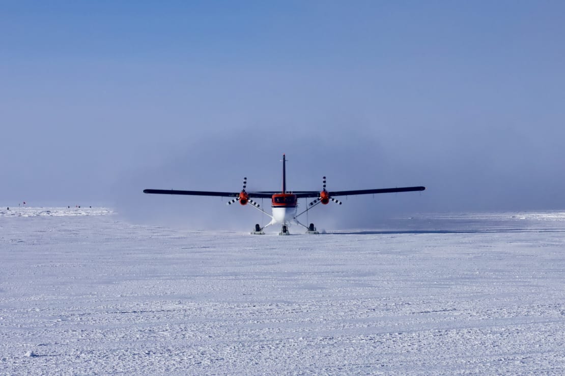 Front view of Twin Otter plane just after landing at the Pole.