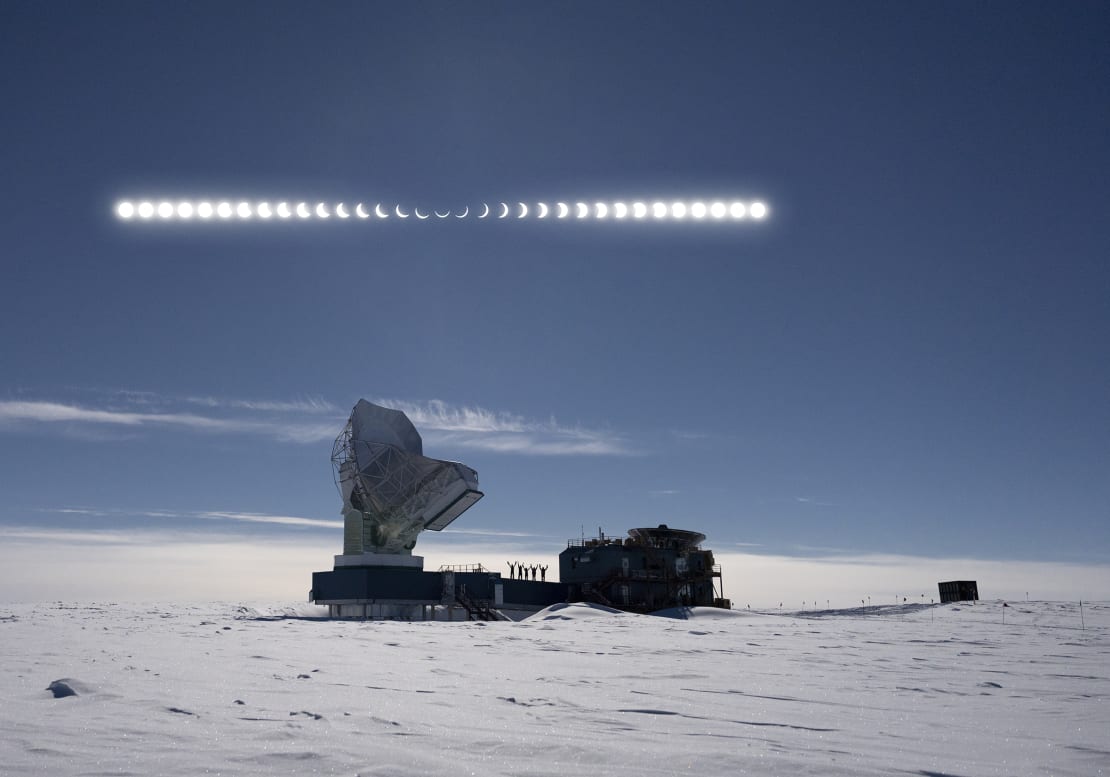 Composite image of moon in blue sky above the South Pole Telescope as it goes through stages of being eclipsed by the sun.