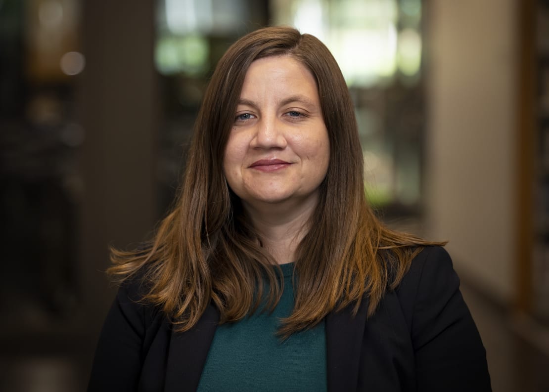 A woman smiling for a headshot.