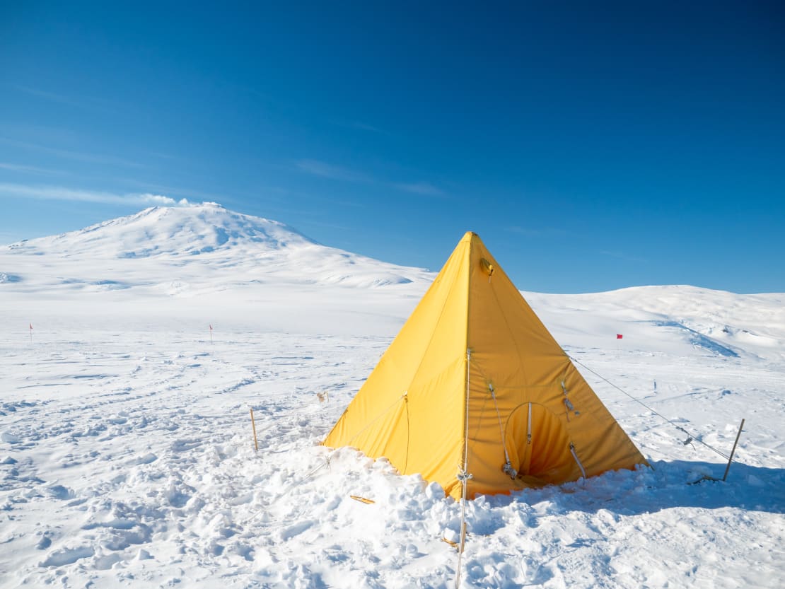 A Scott tent pitched on the icy plateau.