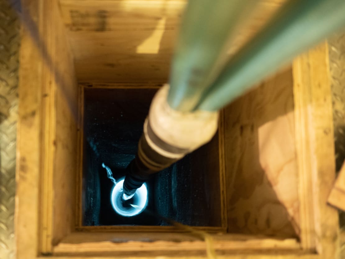 View down the shaft of the rodwell pump, lit by descending camera.