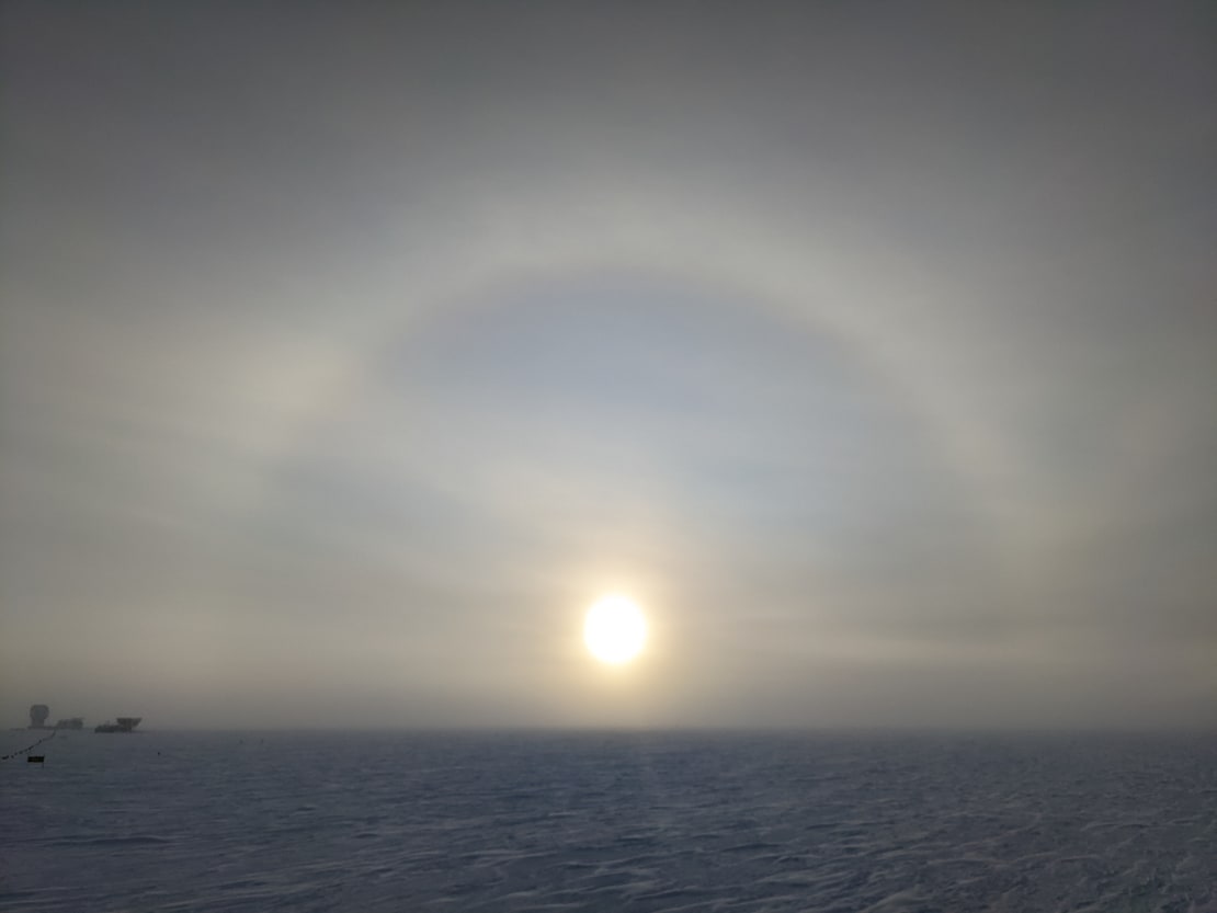 Sun halo around early sun low on horizon at the South Pole.