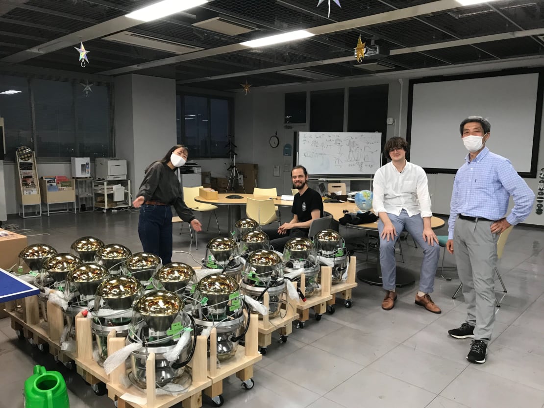 People at Chiba University pictured with a few of the D-Eggs