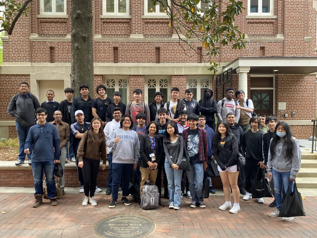 A group of students posing outside for a photo