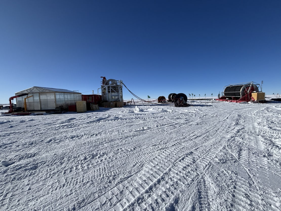 Tower operations on the left, with drill supply hose and module testing facility on the right.