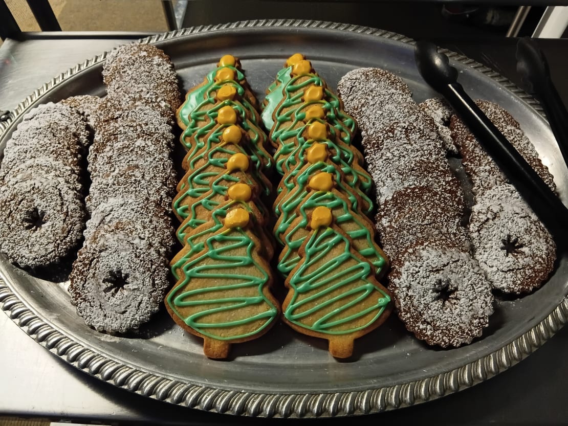 Plate of decorated Christmas cookies.