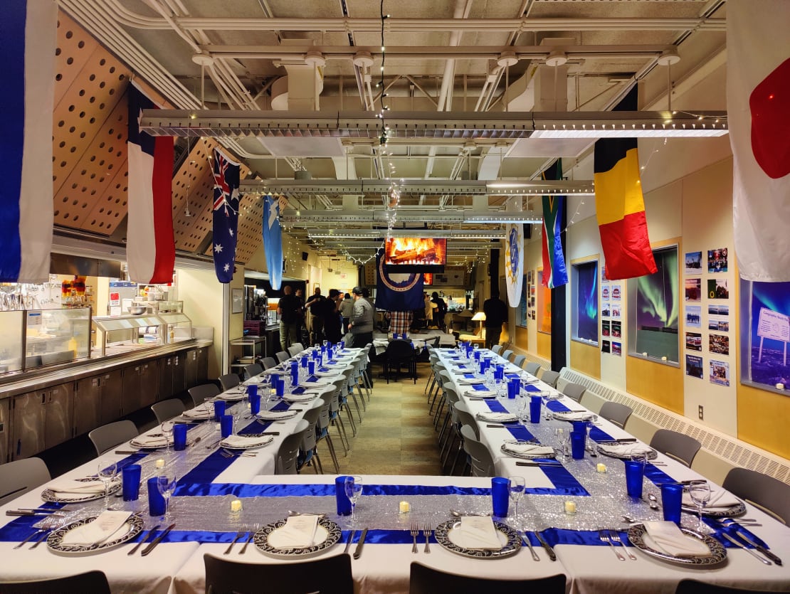 South Pole station galley with formal table settings for the midwinter meal.
