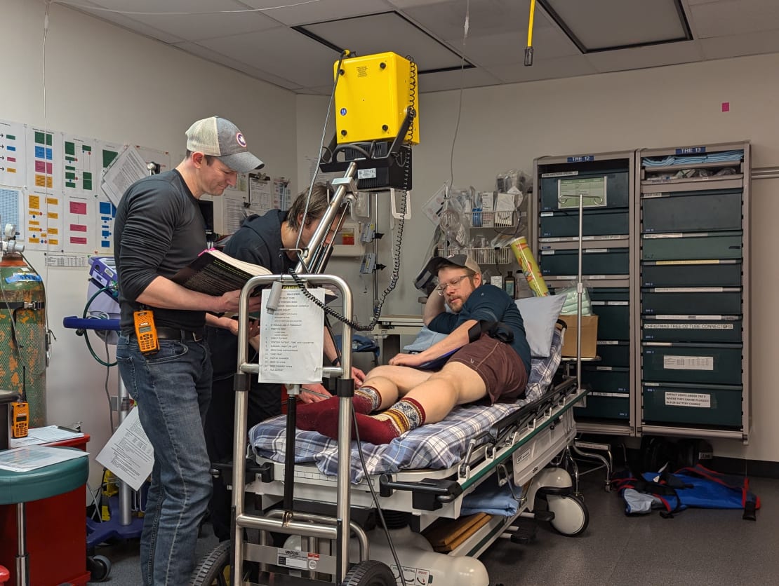 Winterovers in hospital room setting during ERT session on X-rays.