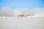 Front view of Basler plane as it is about to take off from South Pole skiway.