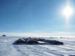 Large fuel bladders parked on the ice at the South Pole.]