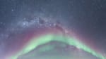 An archway of auroras over the IceCube Lab and the South Pole Telescope.