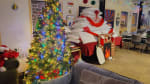 Decorated Christmas tree and cardboard fireplace in the South Pole galley.