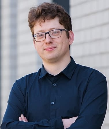 A man posing for a headshot