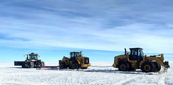 Some heavy equipment connected with a cable.