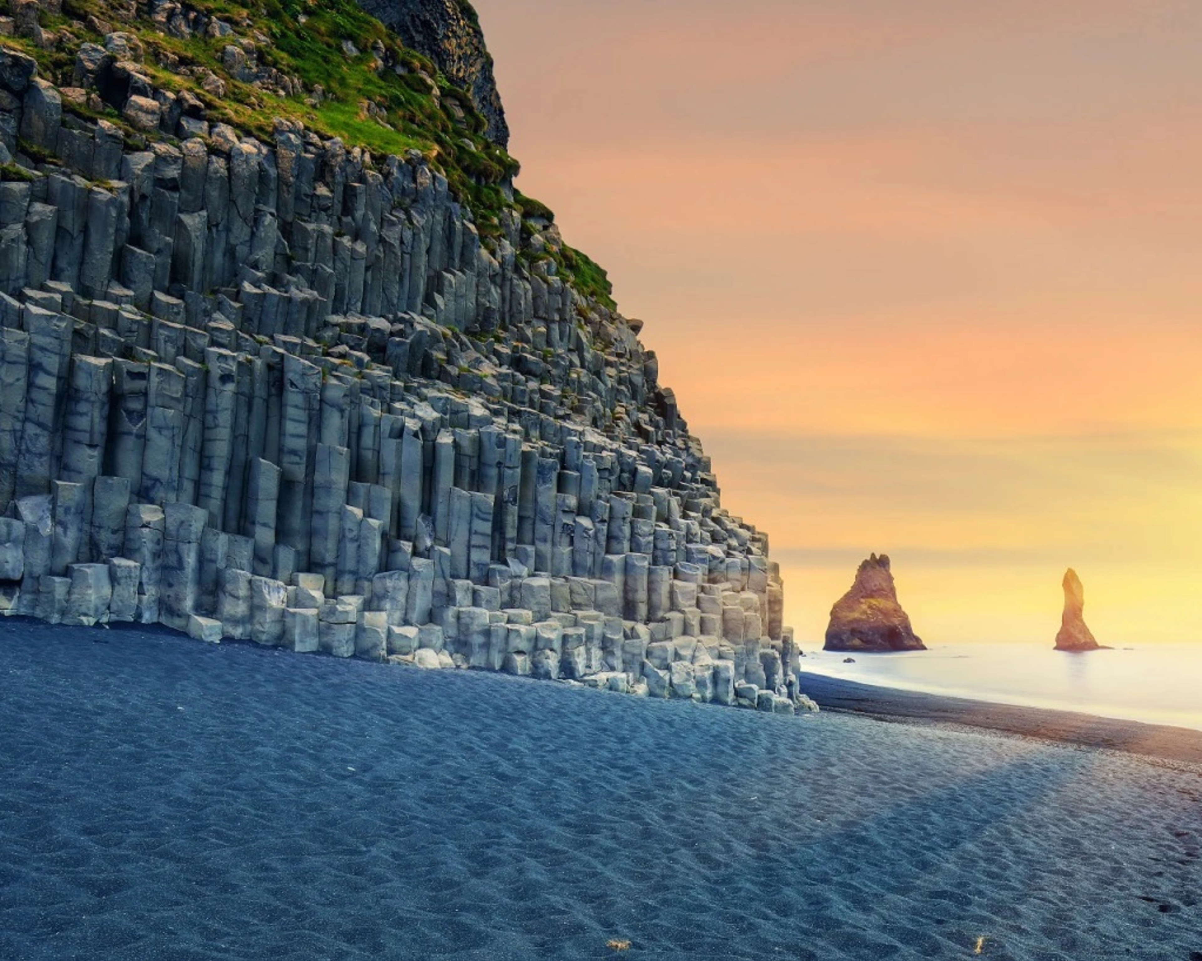 Basalt rock formations on the black sand beach of Reynisfjara