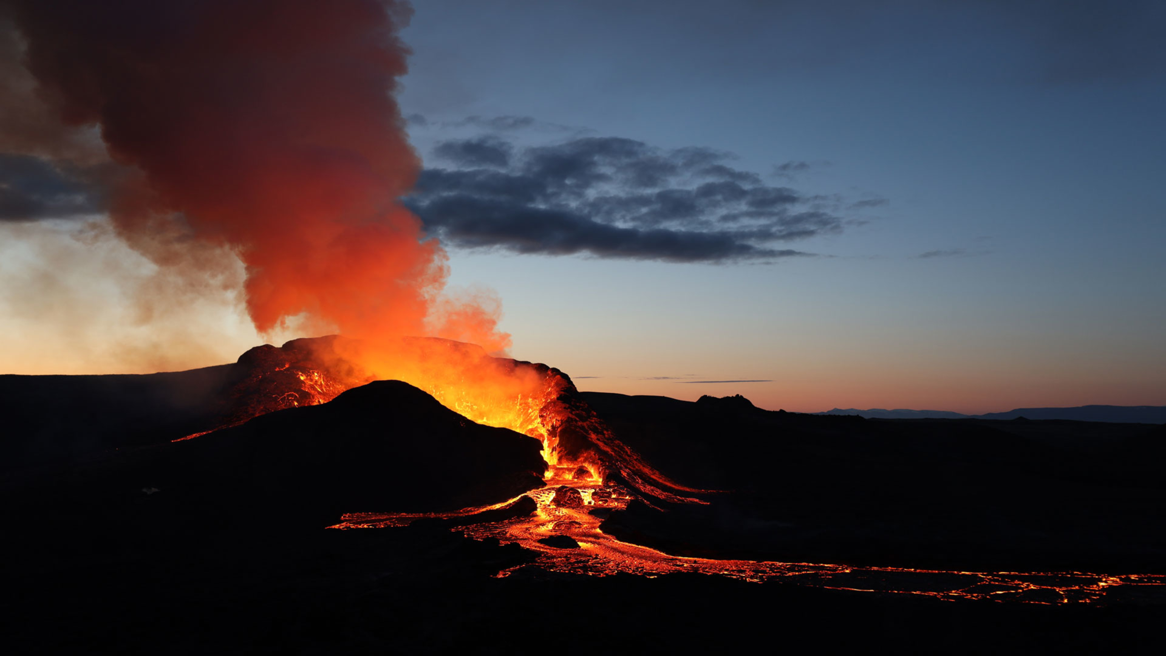 Fagradalsfjall volcano erupting at sunset