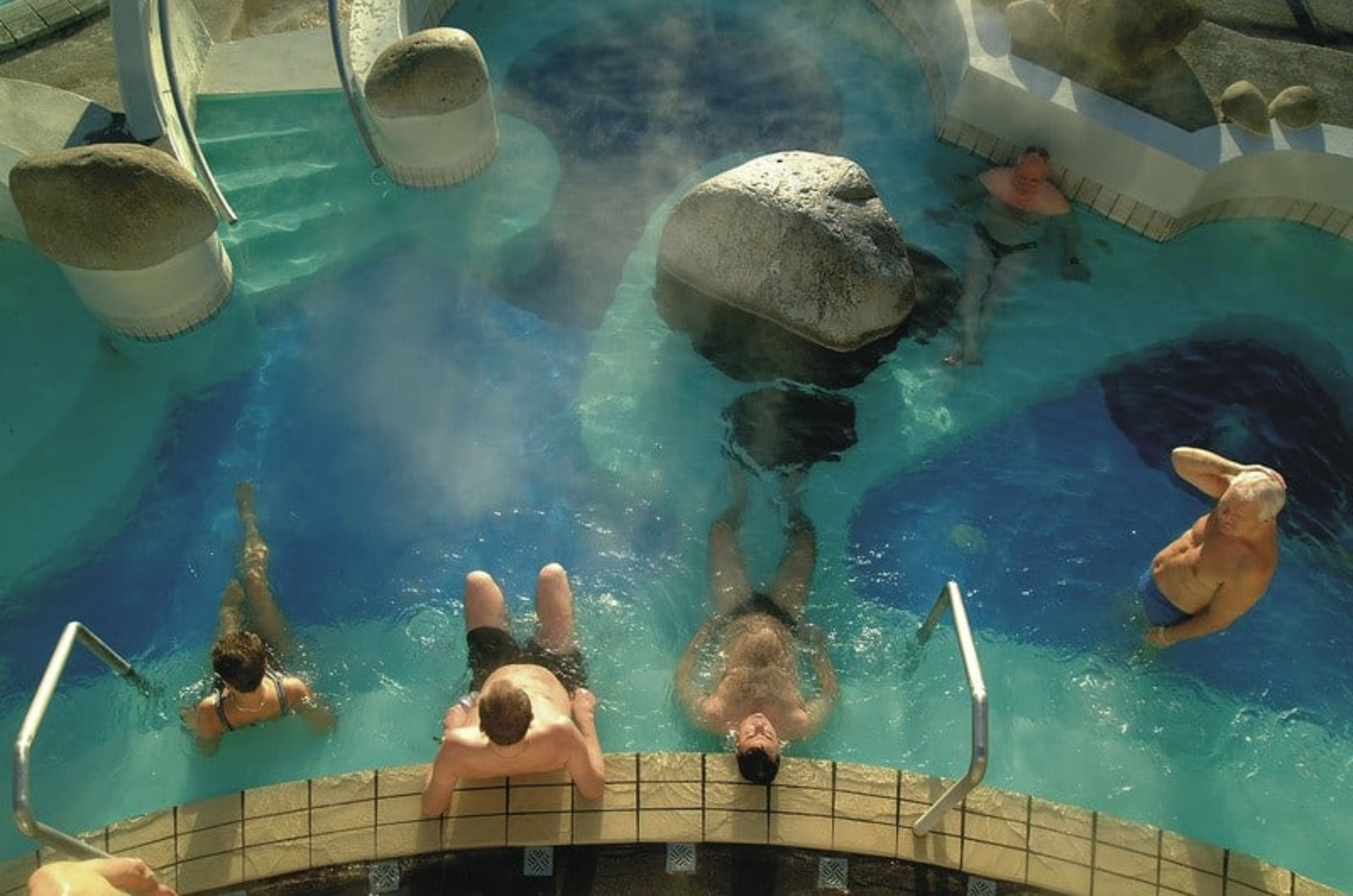 People relaxing in the pool