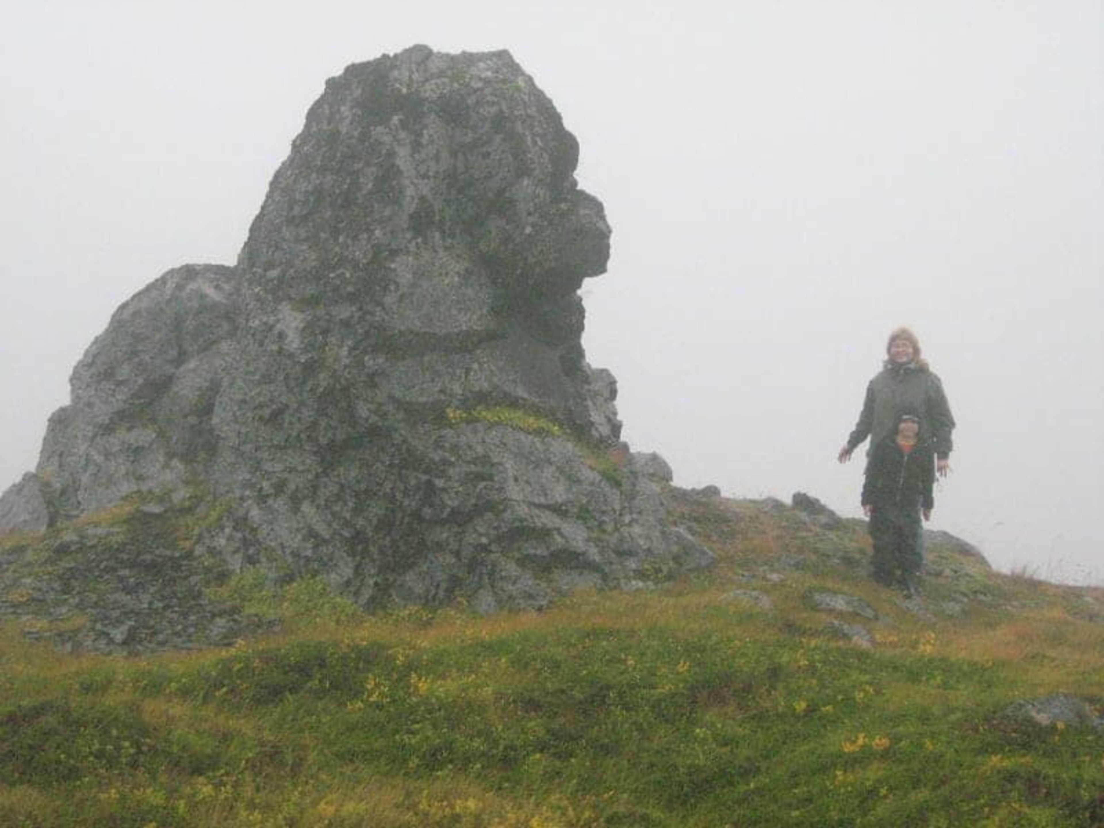 Parent and child looking for elves in Iceland