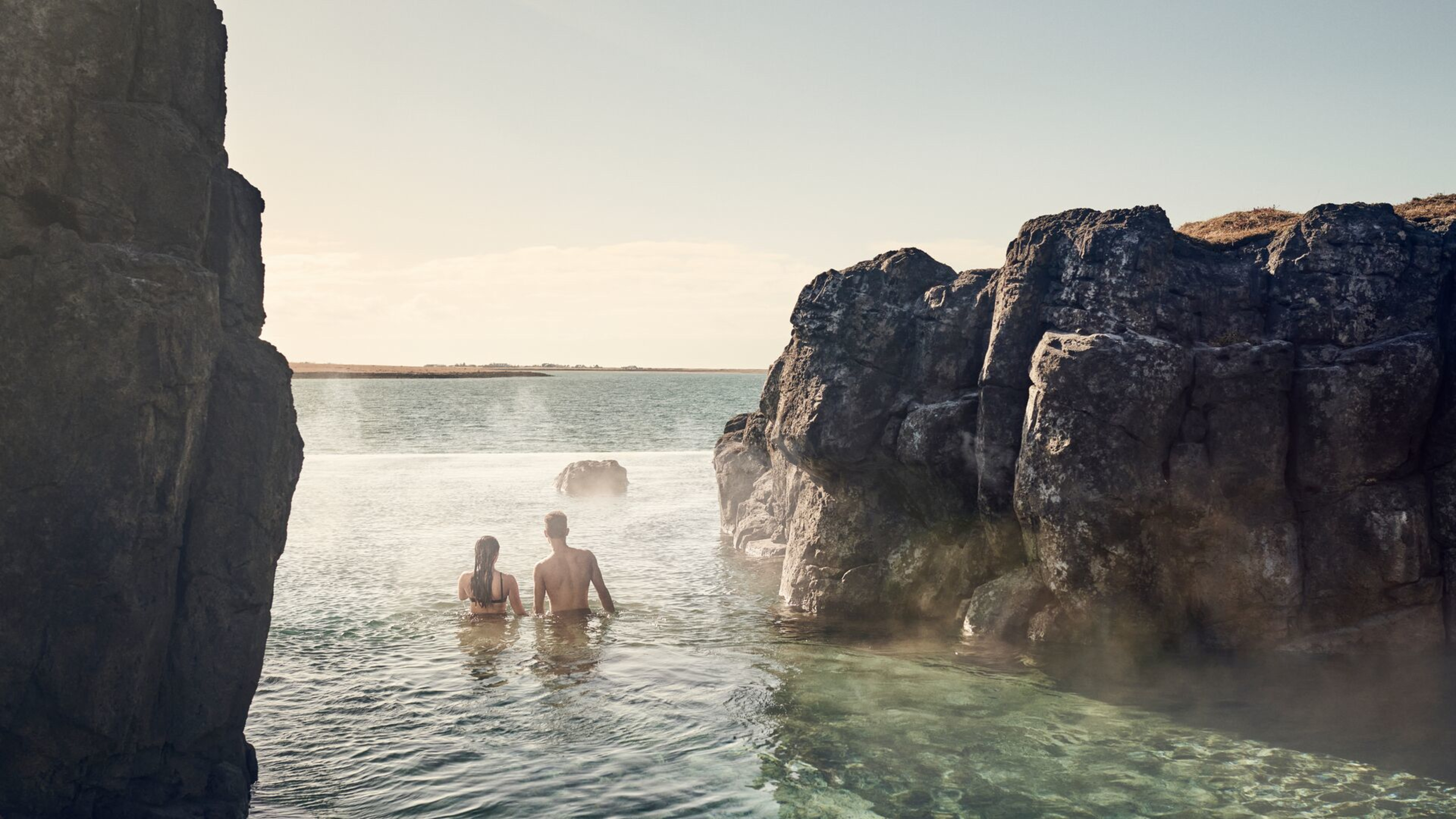 Couple relaxing in the Sky Lagoon.