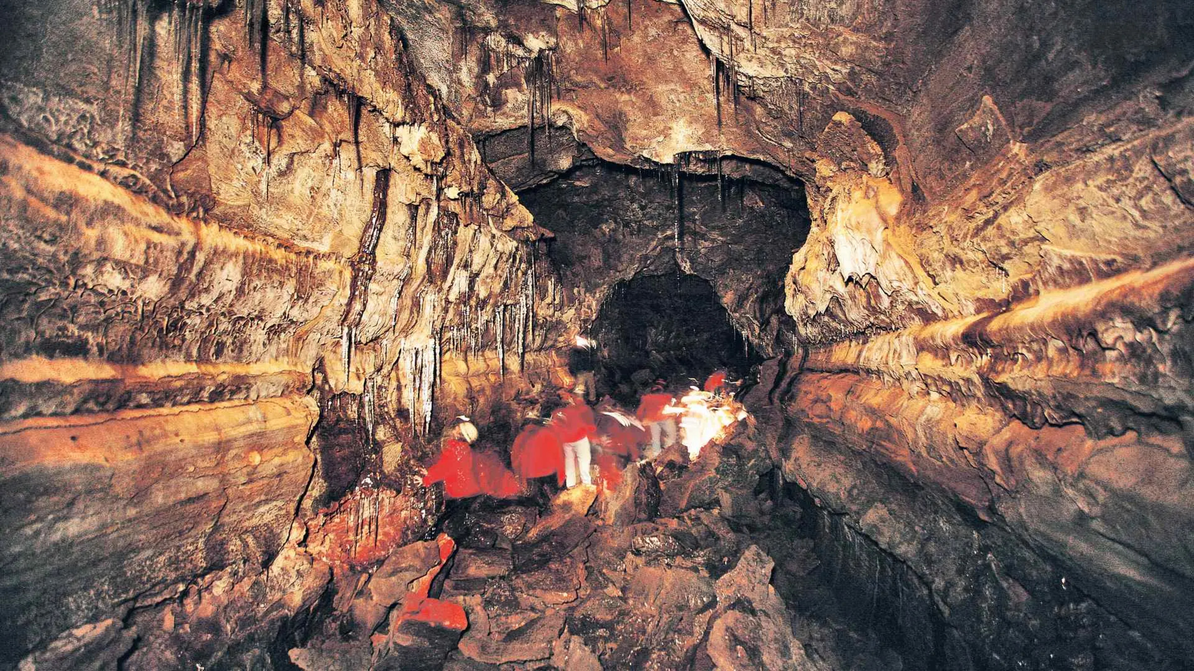 Exploring inside a lava cave in Iceland