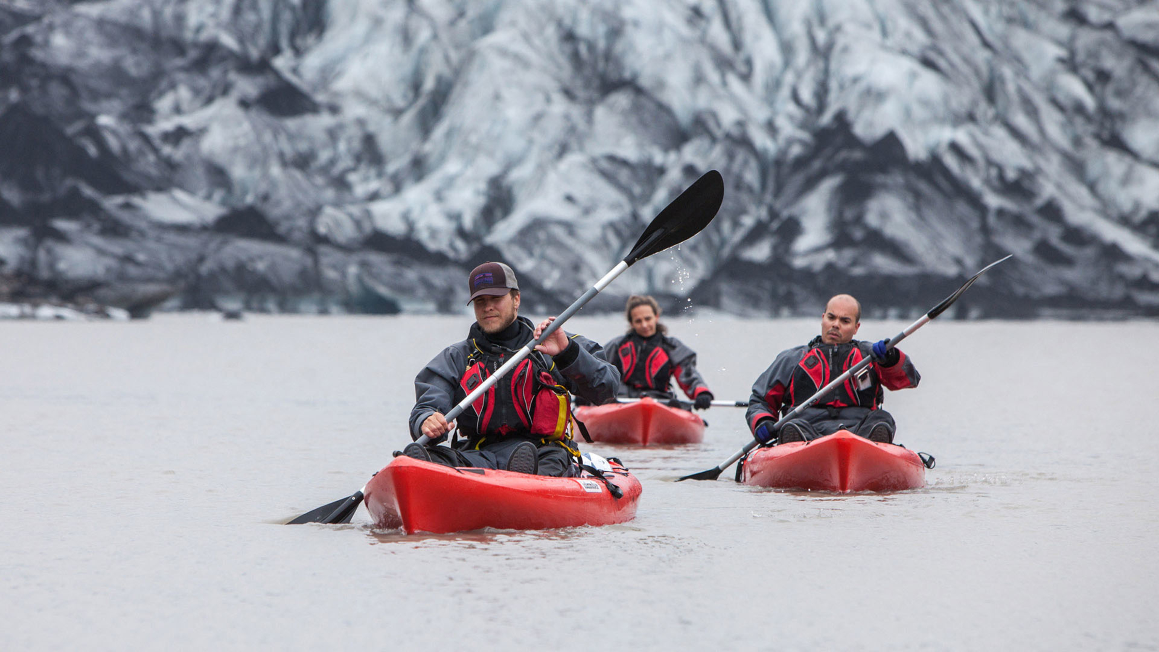 A group kayaking near Sólheimajökull glacier © Iceland Mountain Guides