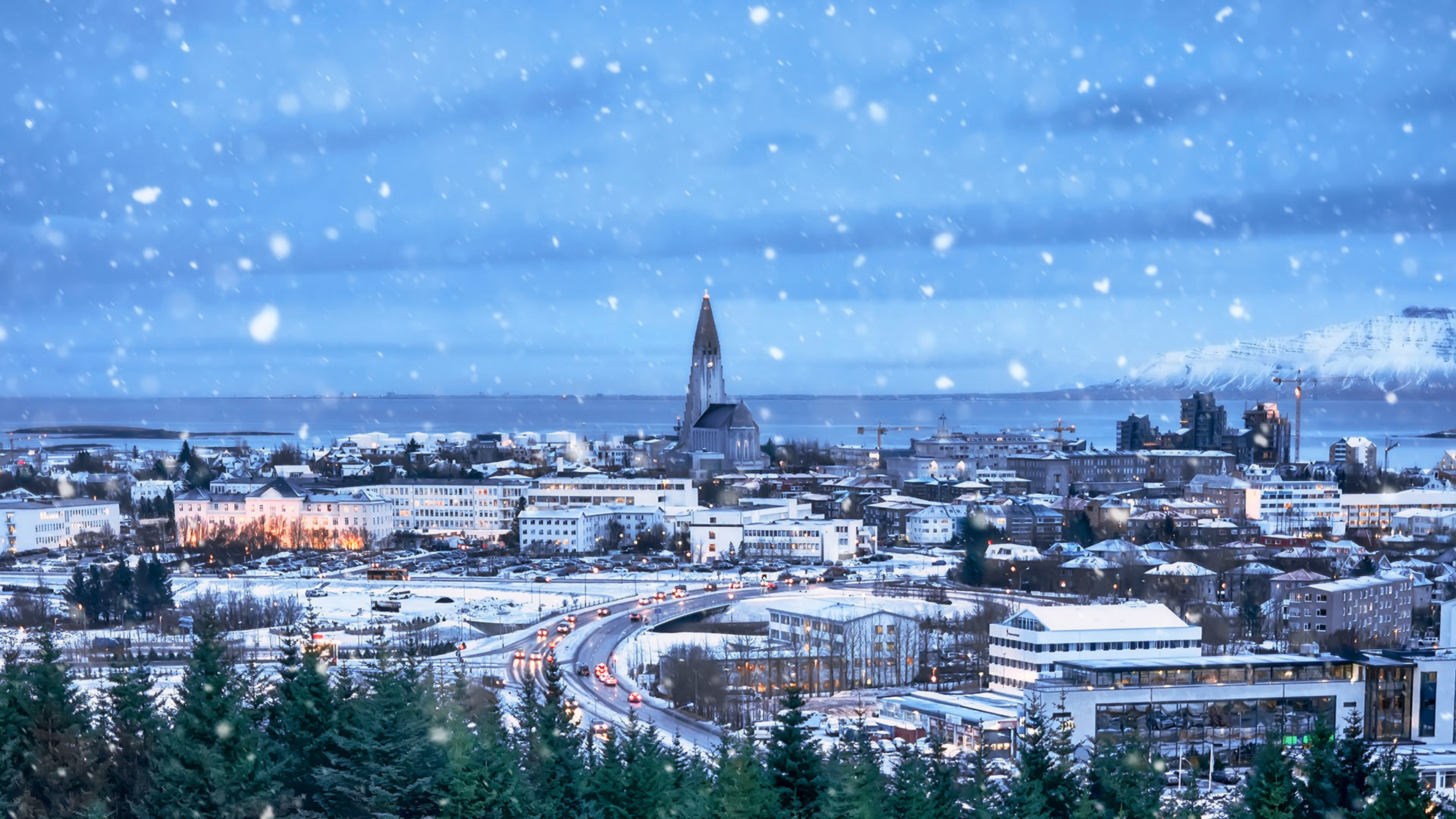 Snow falling over Reykjavík
