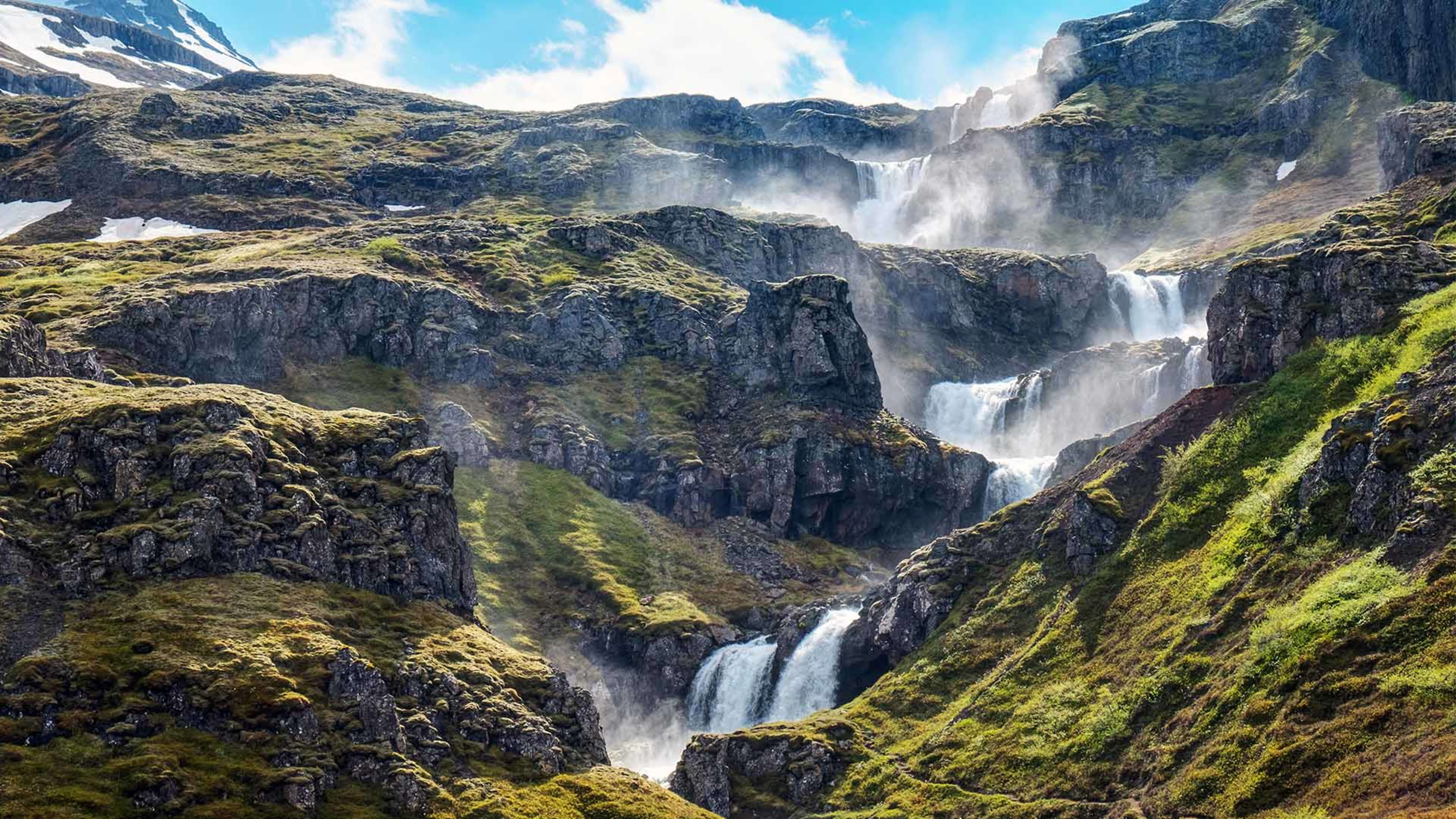 View of the seven tiered Klifbrekkufossar waterfall