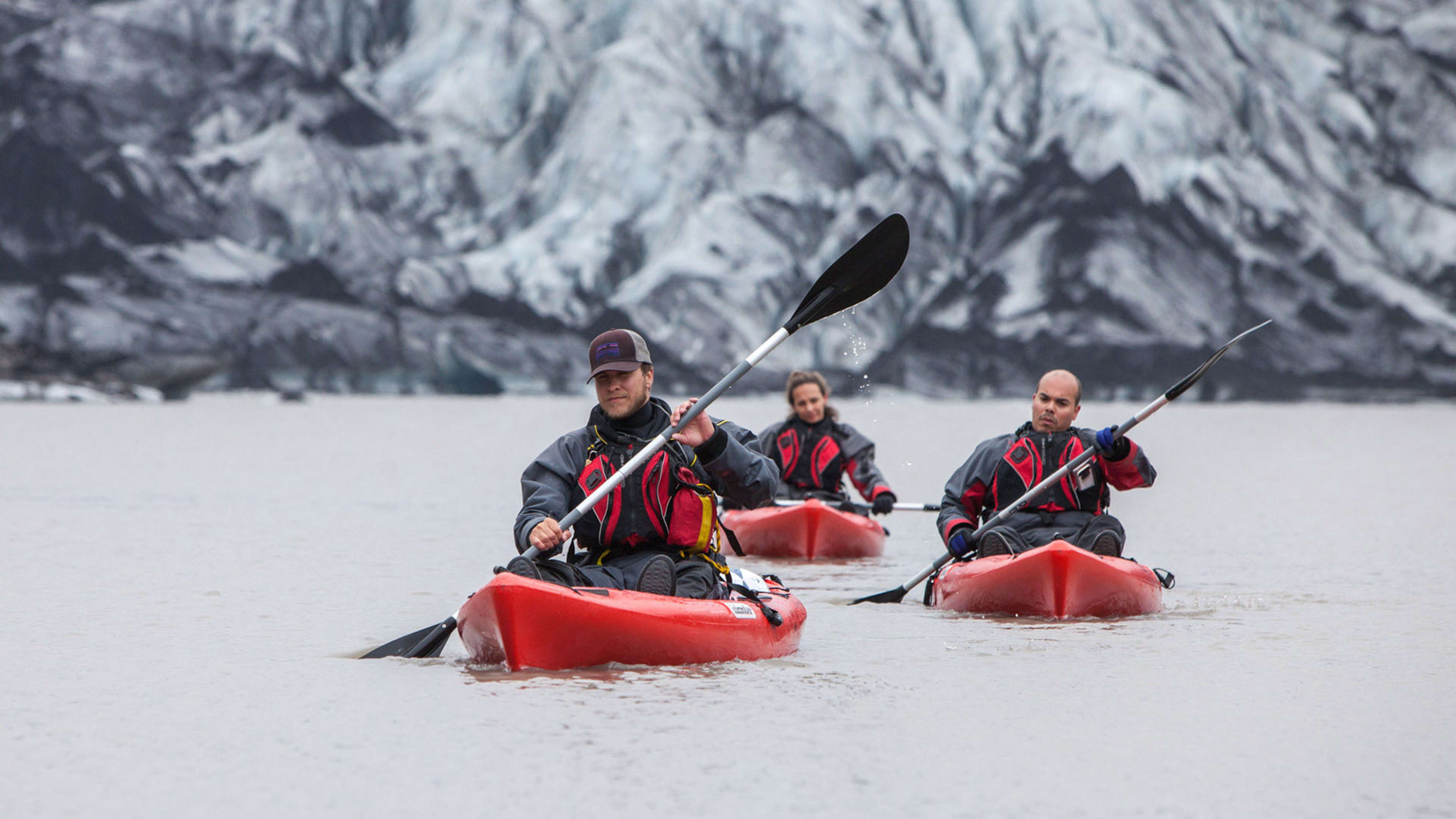 A group kayaking near Sólheimajökull glacier © Iceland Mountain Guides