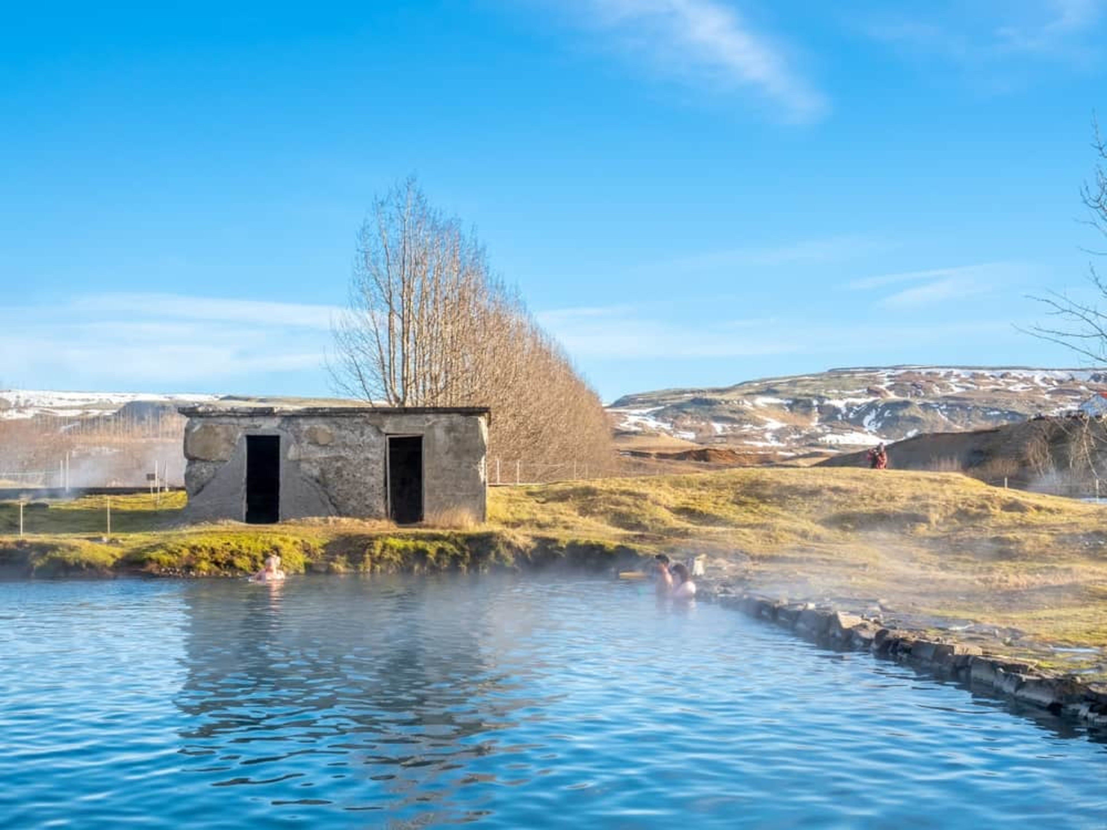 People bathing in secret lagoon