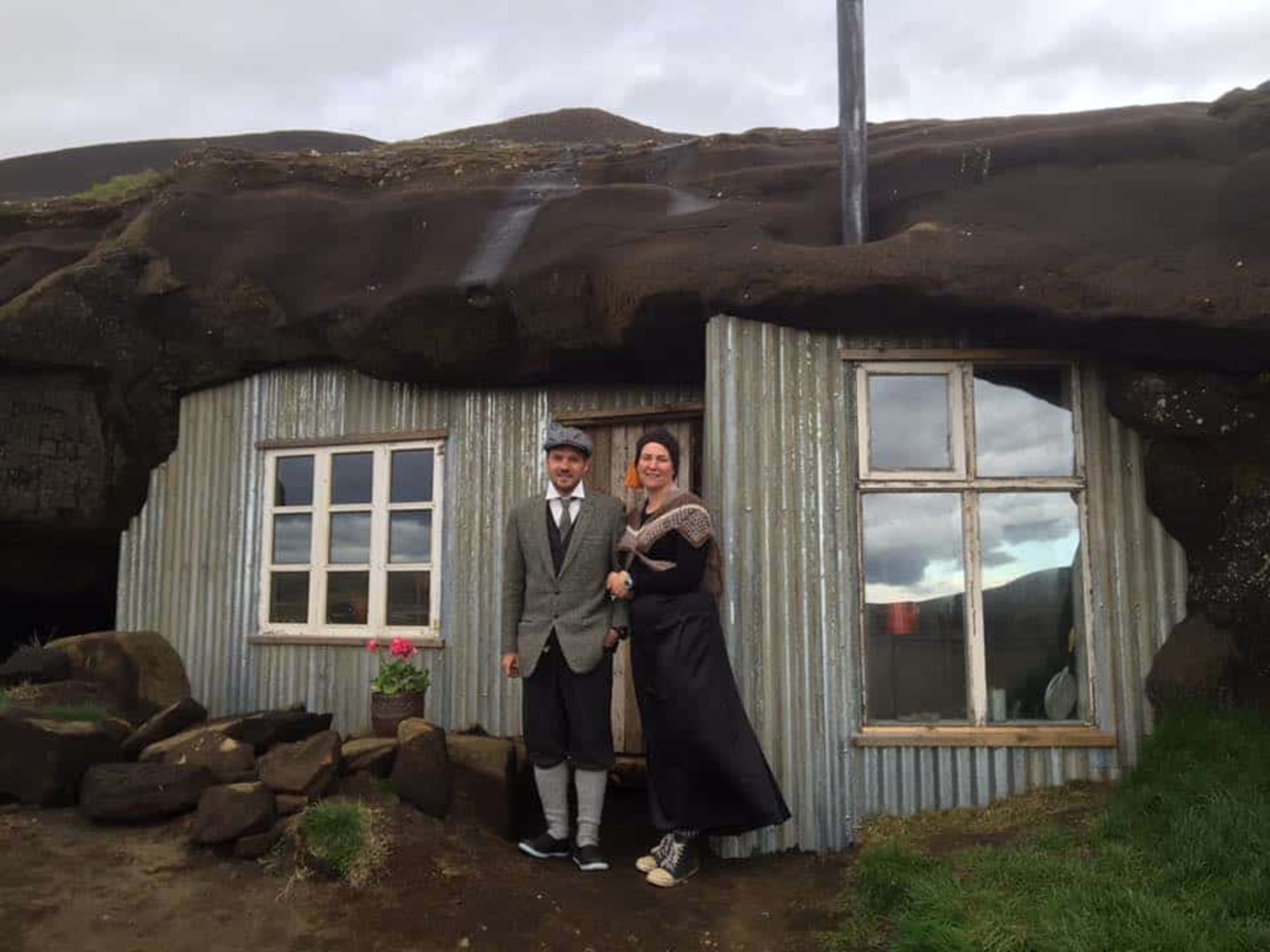 Icelandic Cave People reenactment group in front of the cave house