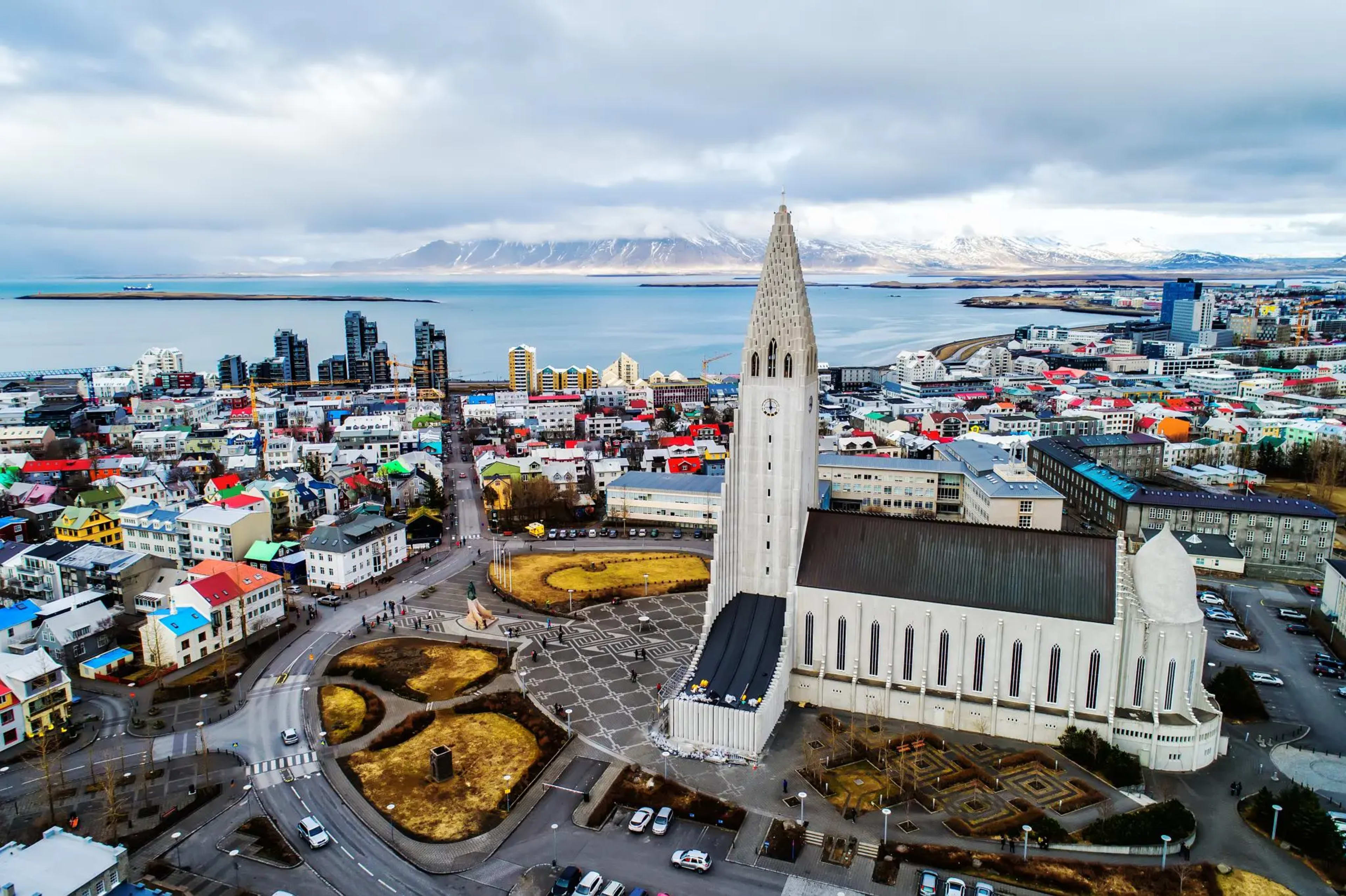 Hallgrimskirkja church in Reykjavik with Mount Esja in the background