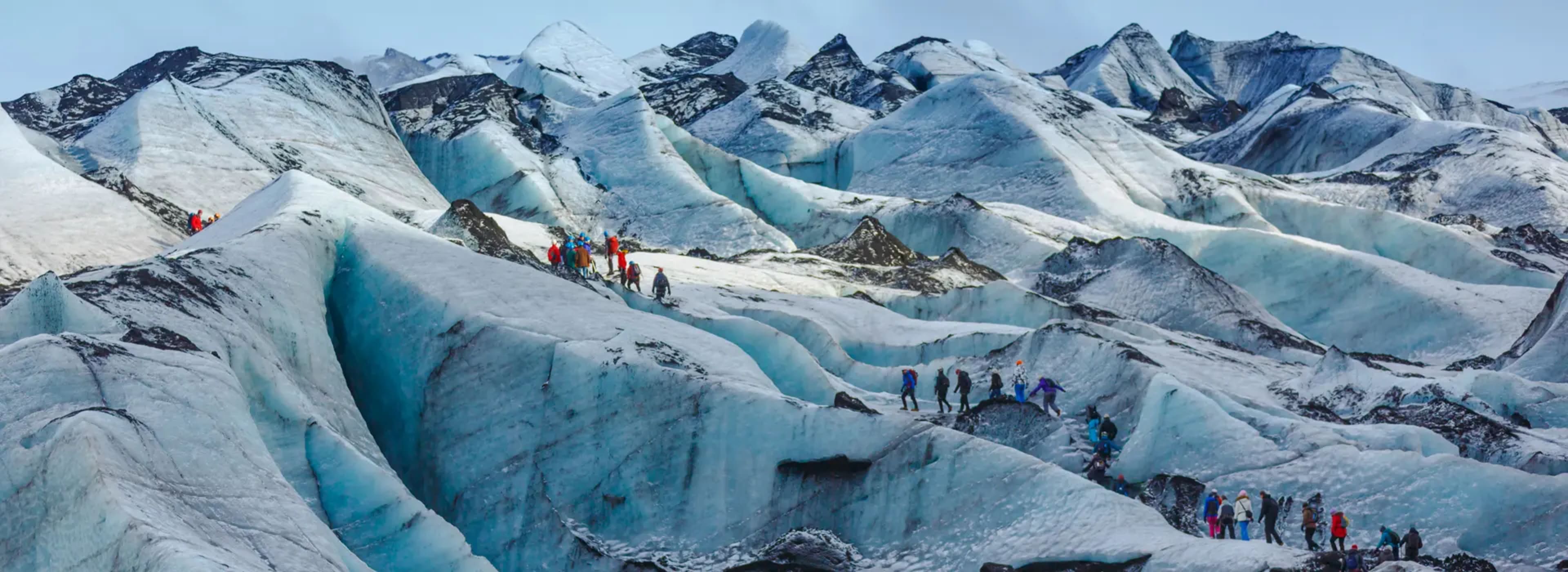 Hikers walking Solheimajokull glacier