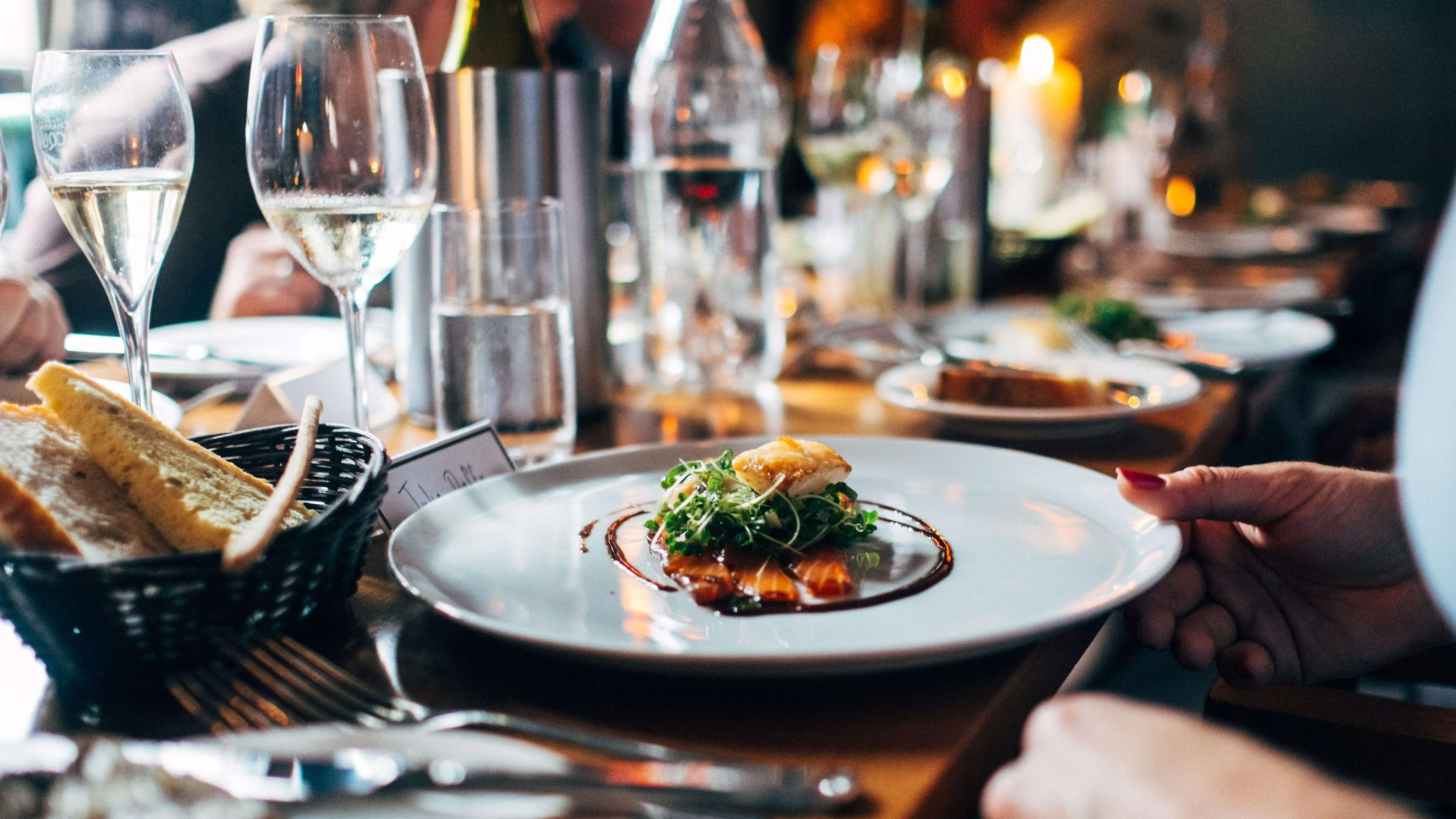 Table of food and wine at a restaurant in Iceland