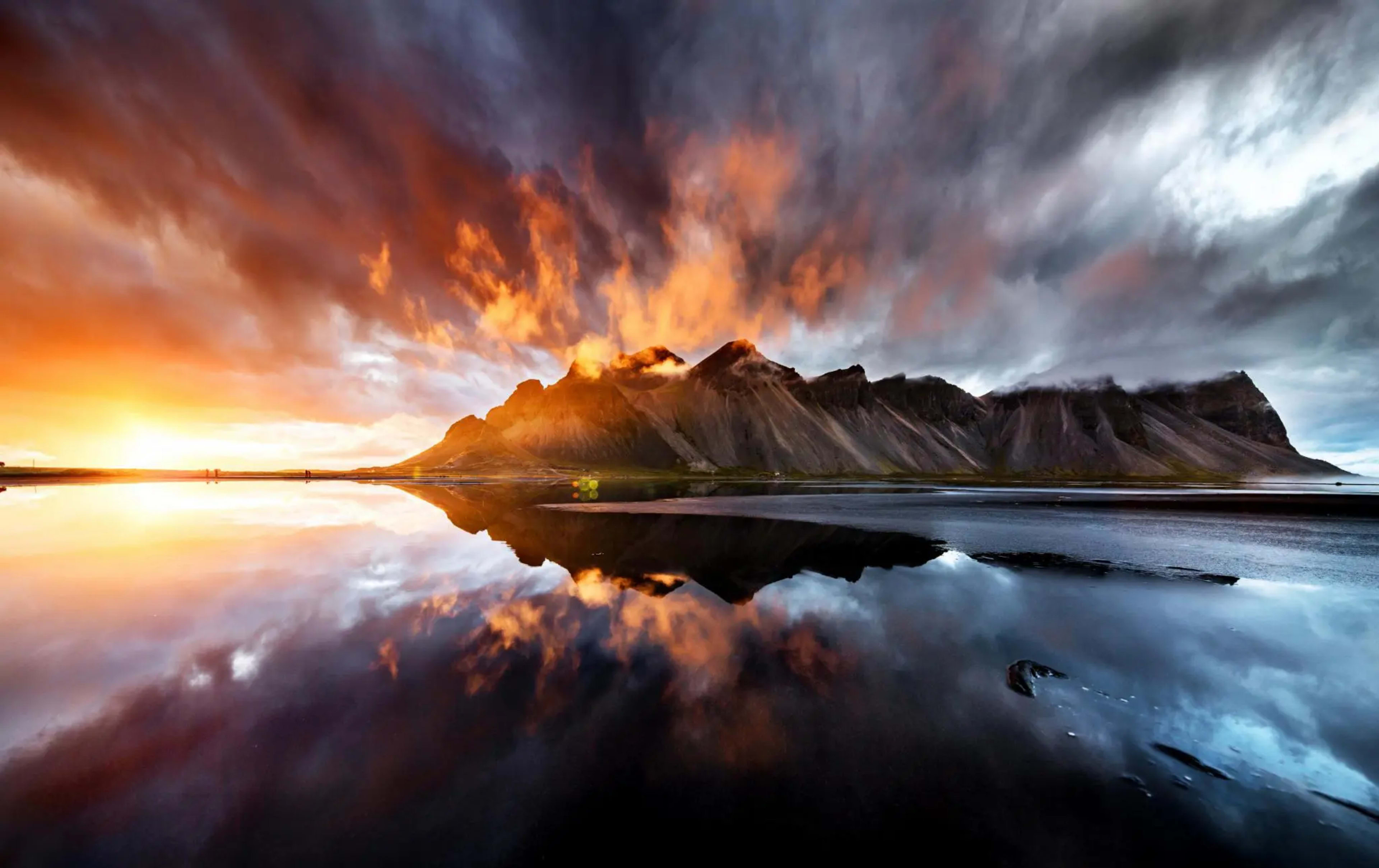Sunset and moody skies behind the Vestrahorn mountains