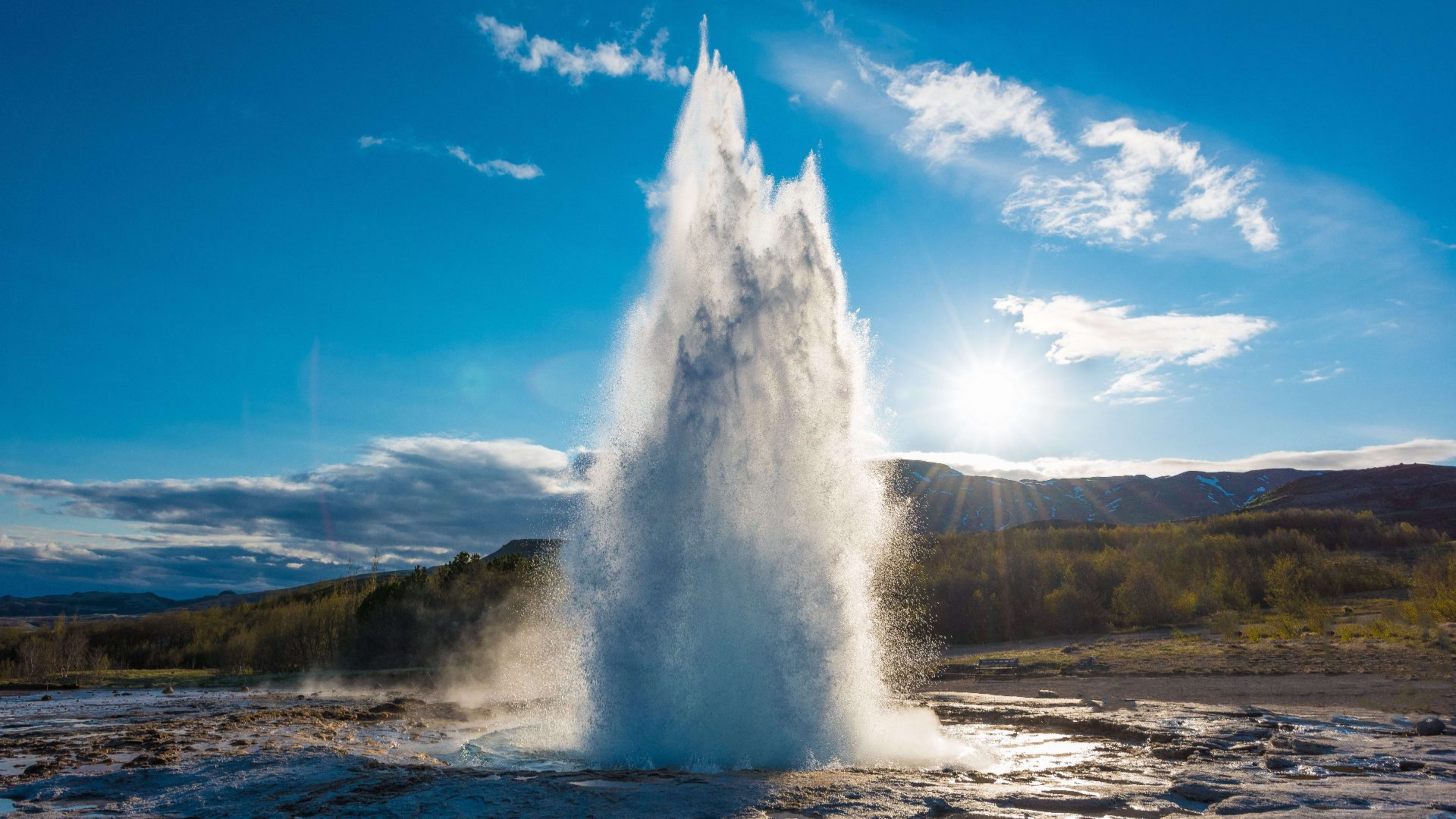 Strokkur erupting on a sunny summer day