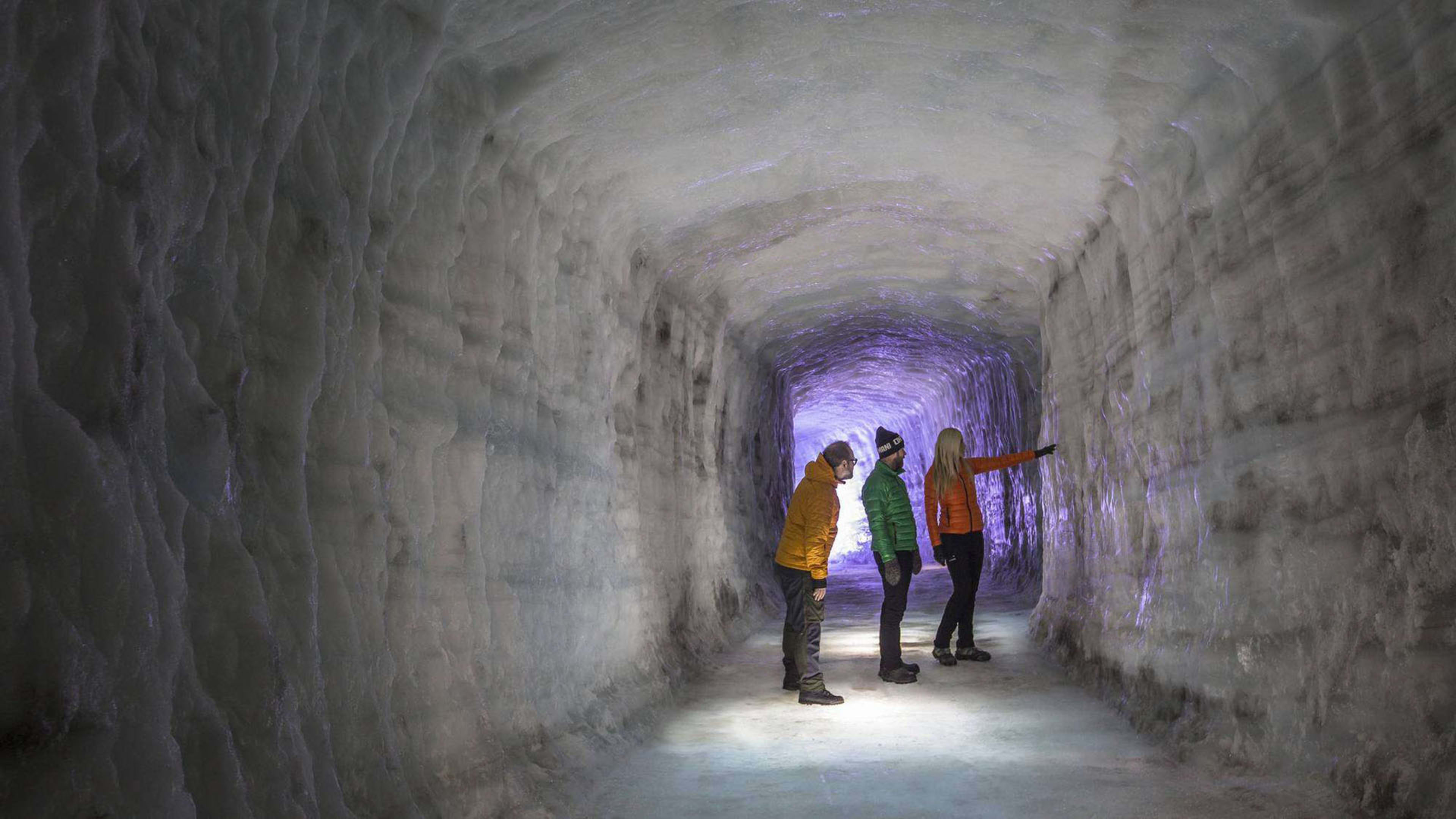 Group of people inside glacier cave, Iceland