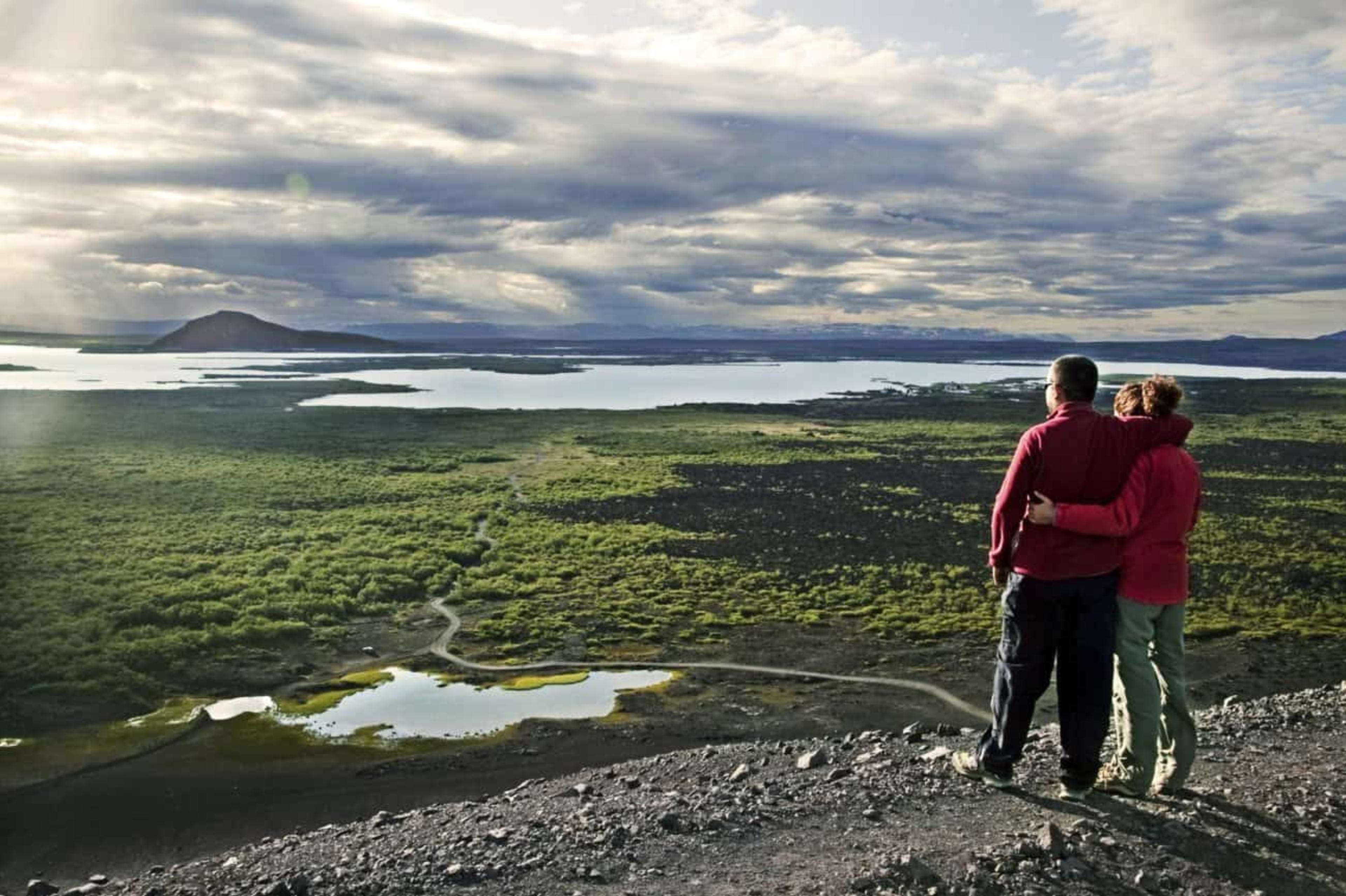 Couple enjoying the view over Lake Mývatn