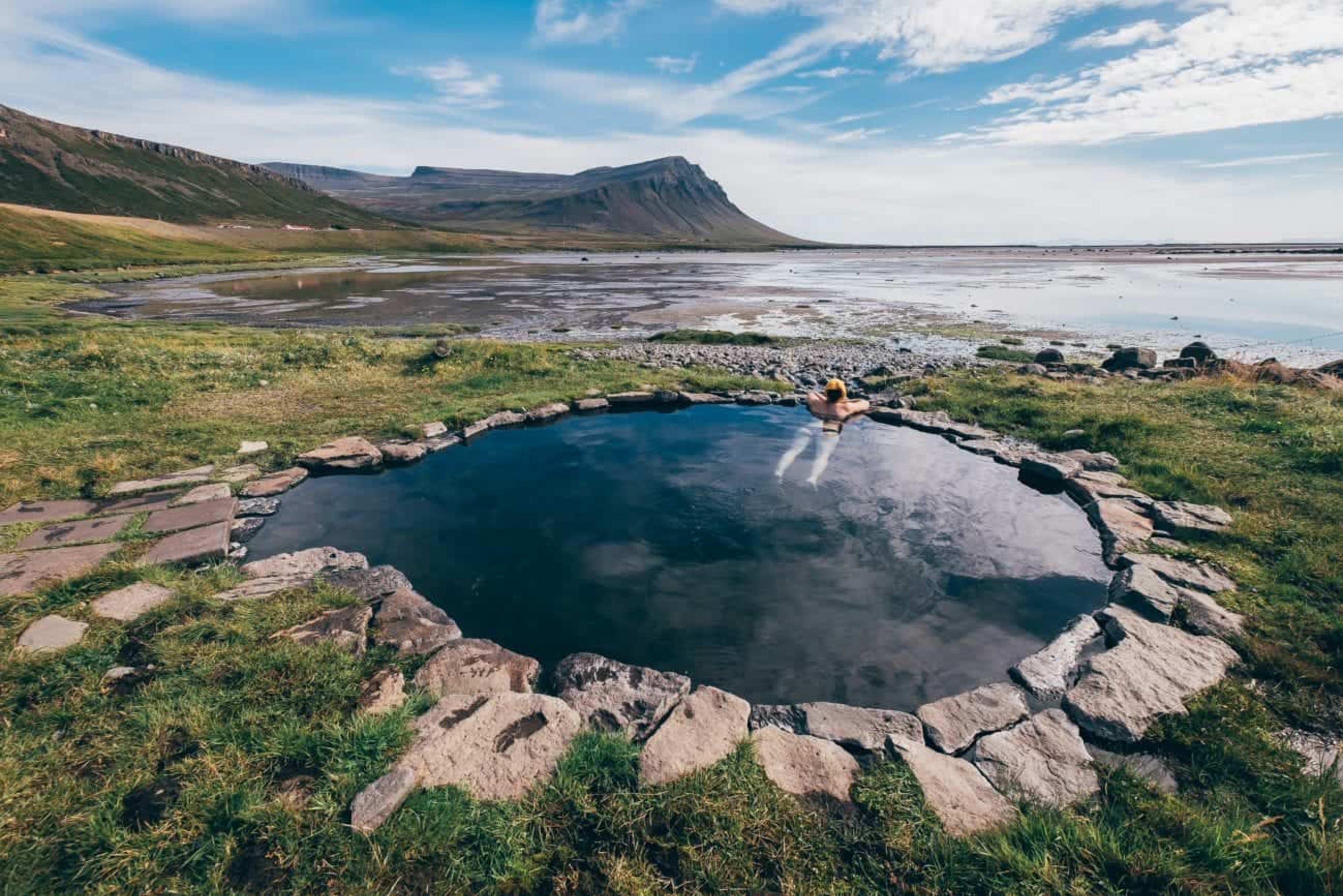 A person bathing in a hot spring