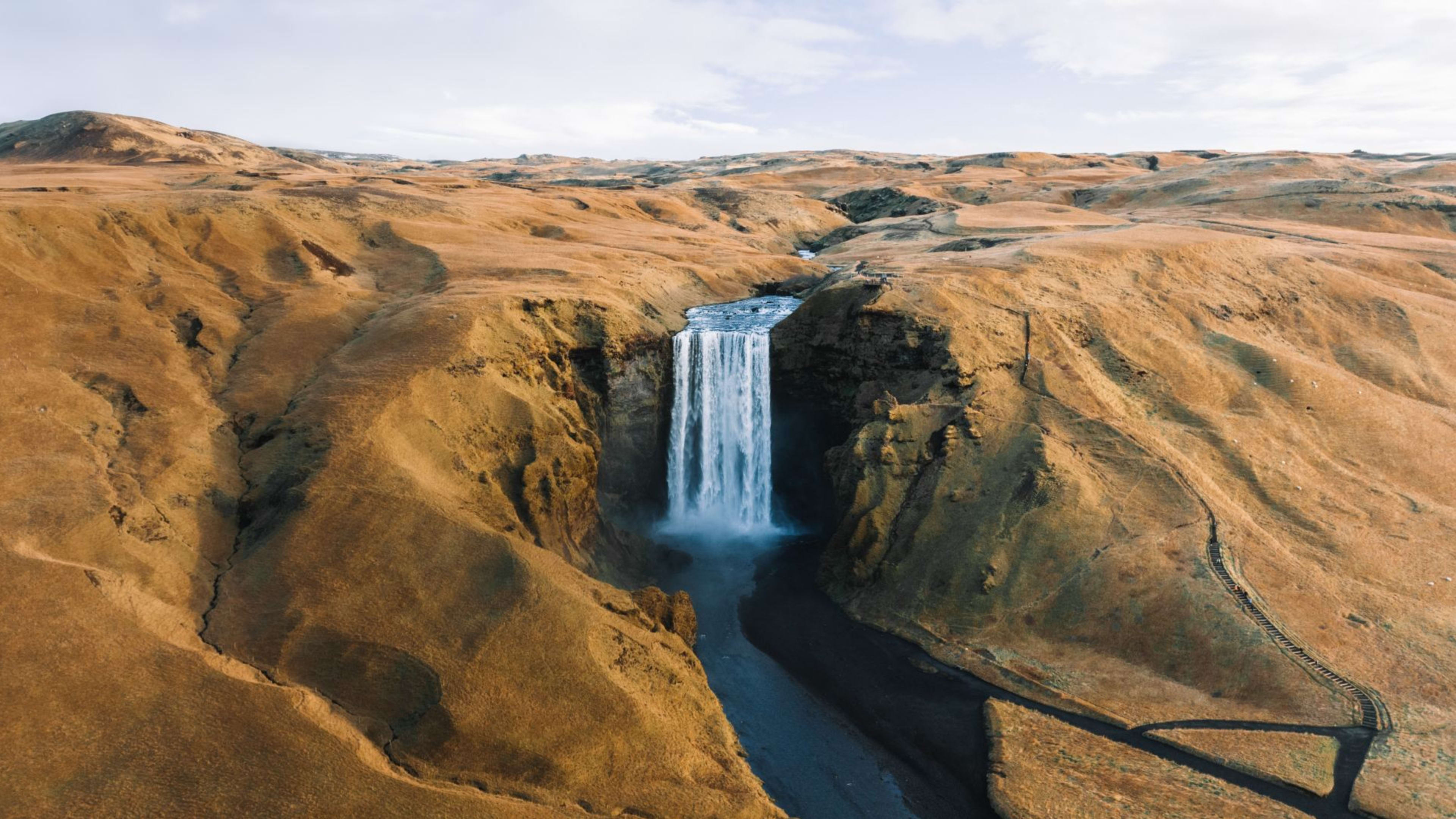 The Skógafoss waterfall as seen from above in winter