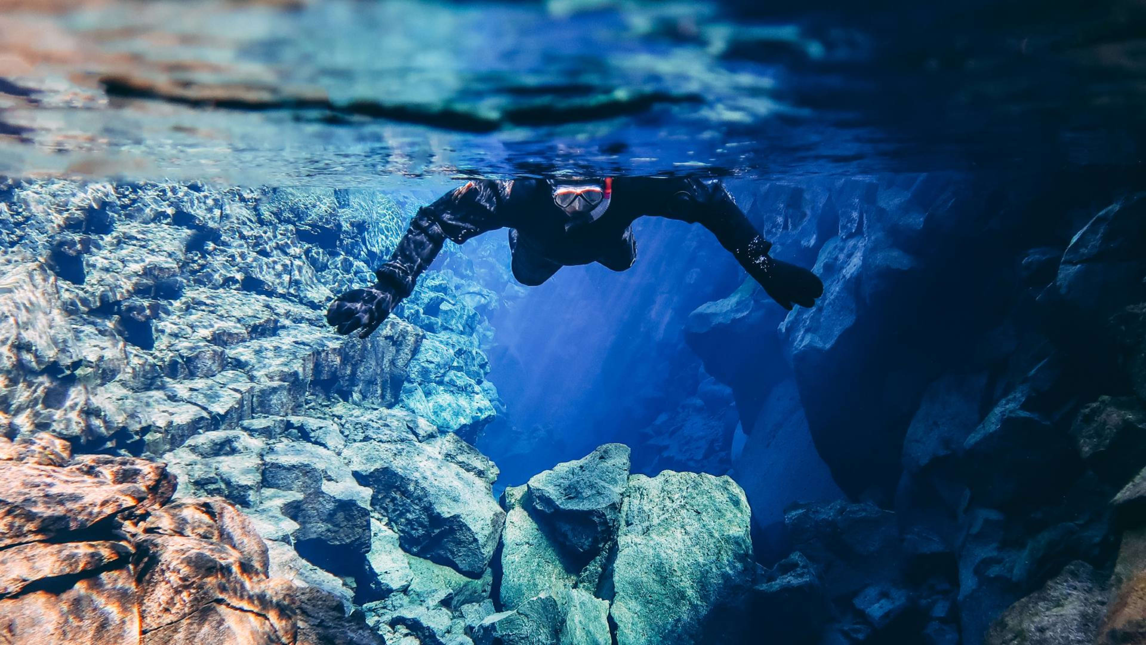 Snorkeling in the Silfra gorge © DIVE.is