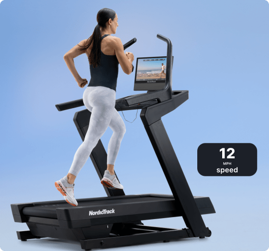 woman running on the X16 Treadmill