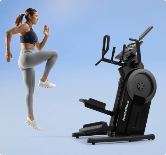man exercising along side the x16i elliptical