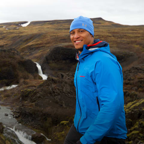 Coach walking in the mountains.