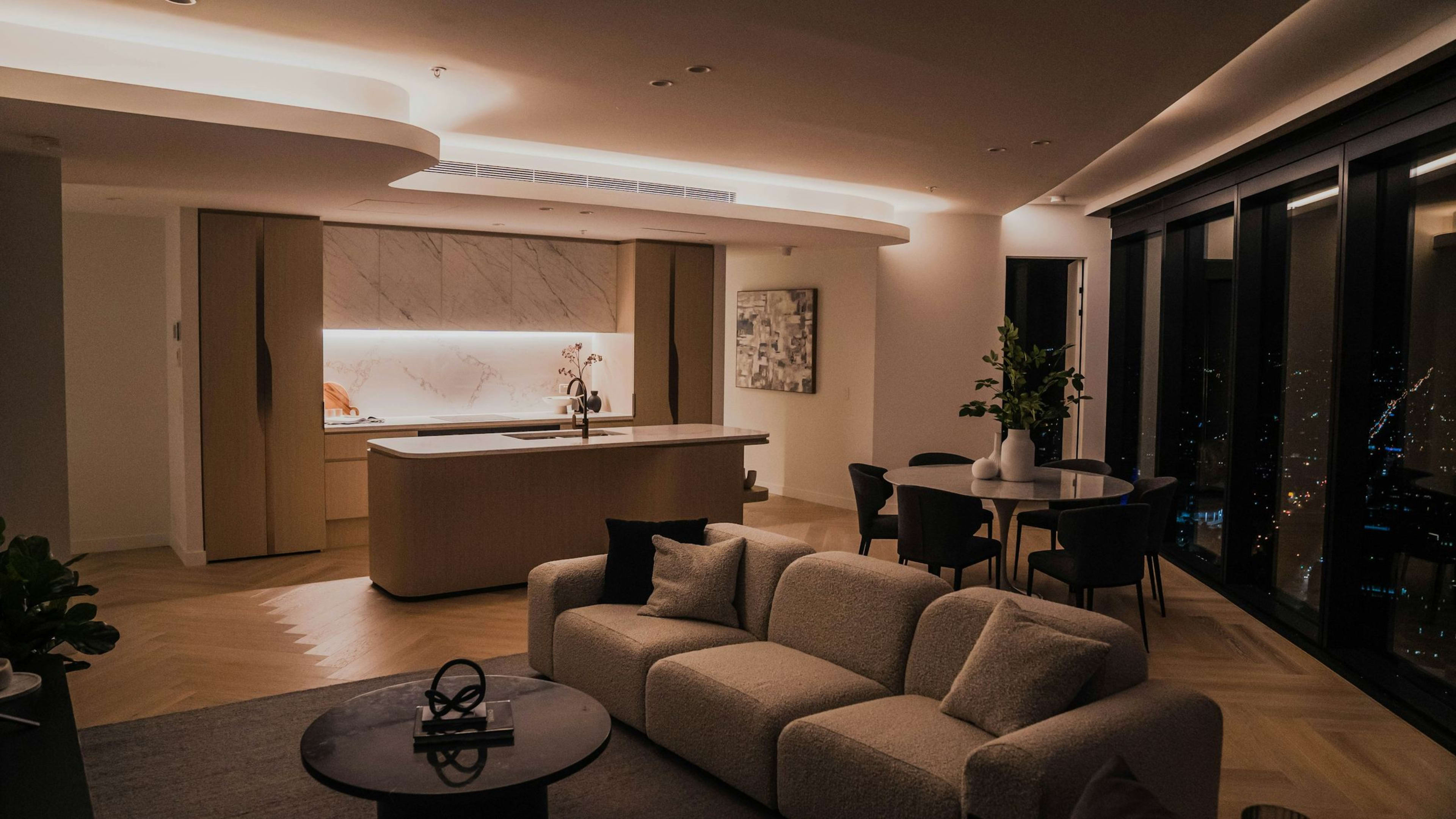 A furnished living room in the evening light
