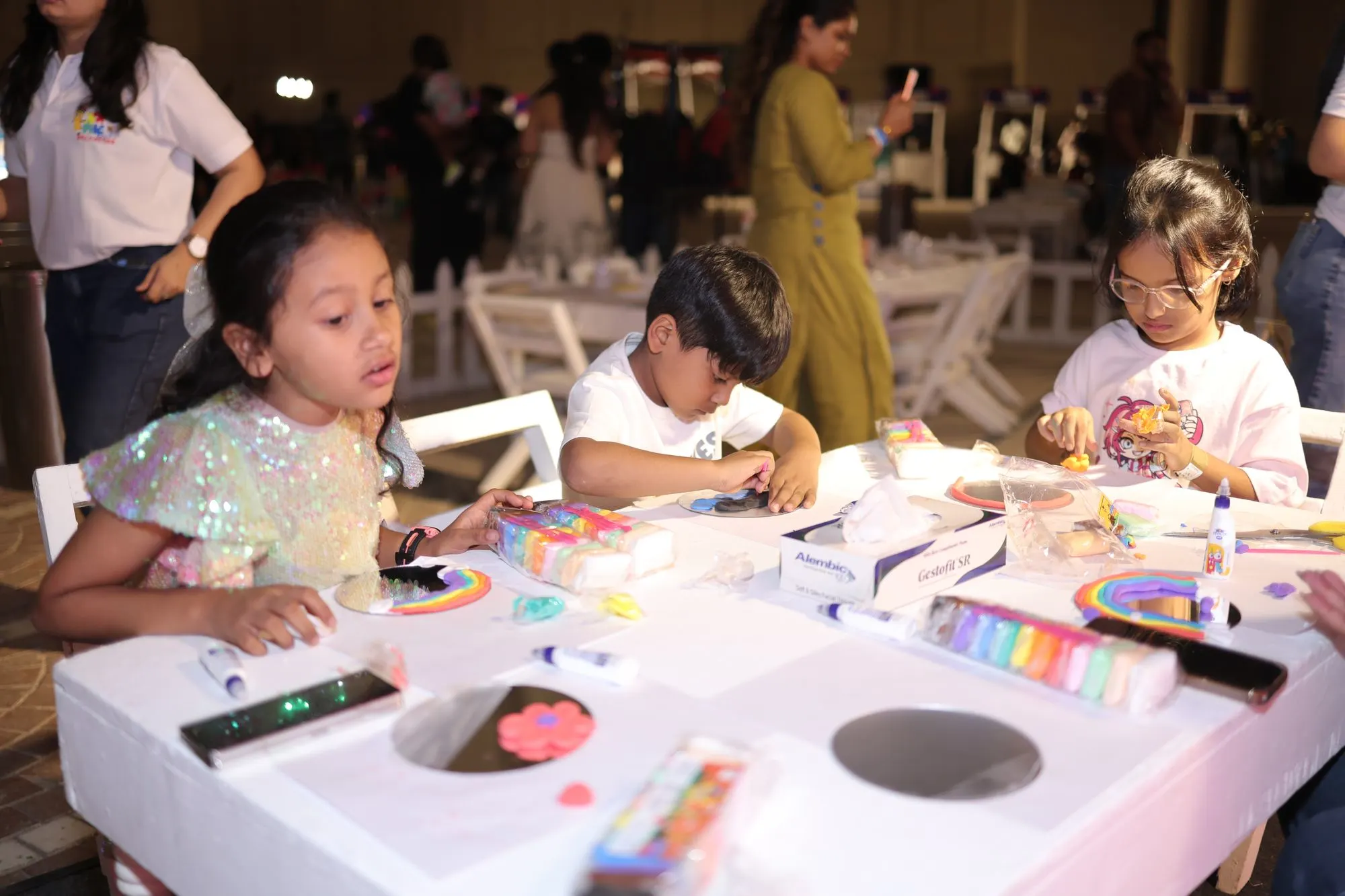 Children at a colouring table at Toddler Techno Party