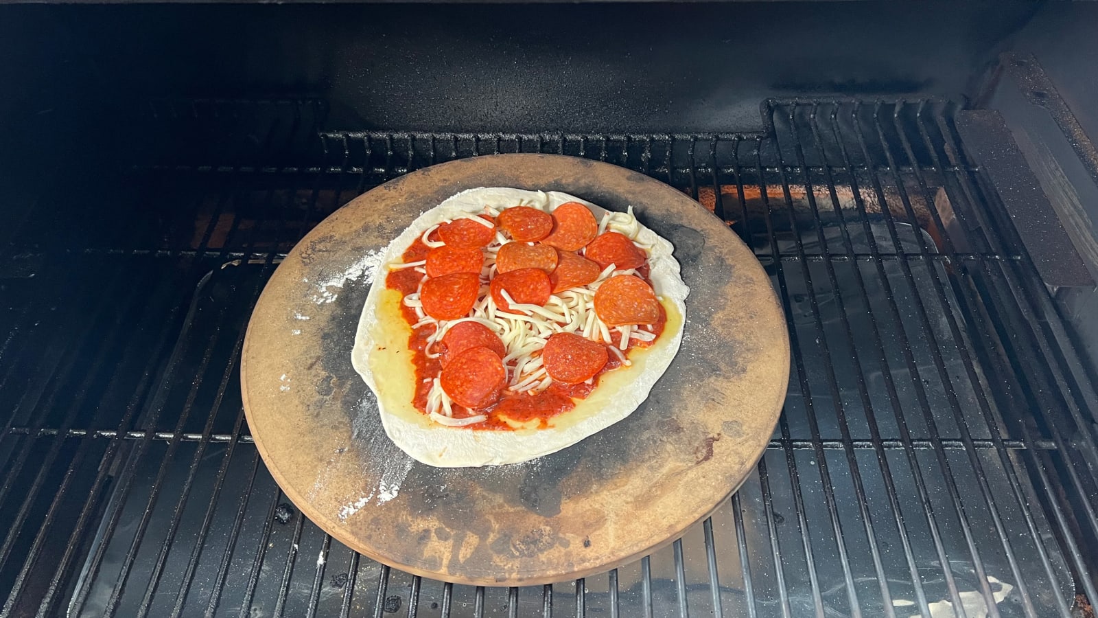 Pellet Grill Pizza being cooked on a pellet grill